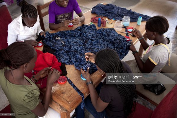 Students sew in a fashion school in Nigeria