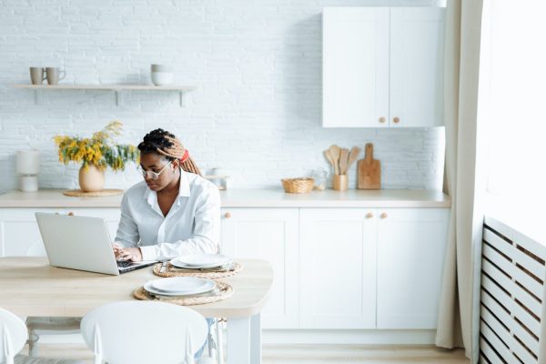 student leaning on a table 